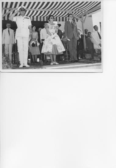King Paul, Queen Frederica and Prince Constantine of Greece as they are saluting graduating students, 1954
