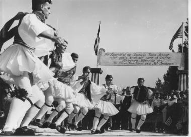 AFS students dressed in traditional customs, dancing to welcome U.S. V.P. Johnson, 1963