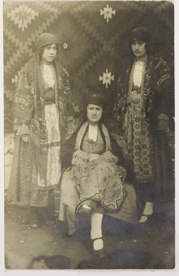 Young girls in traditional costumes on a national holiday