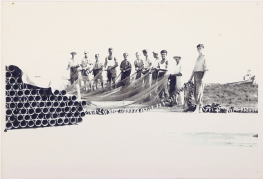Fishermen spread their nets in the old Port of Thassos