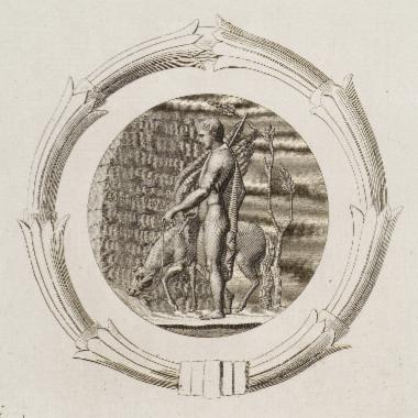 Μετάλλιο εμπνευσμένο από αρχαίο κόσμημα, πλαισιωμένο με τον στέφανο των Ισθμίων. Παρίσταται ο Βελλεροφόντης να ποτίζει τον Πήγασο.